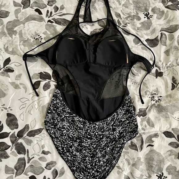 Rare LIKE NEW Lululemon cutout one piece swim suit with tie detail in back. - Picture 4 of 5